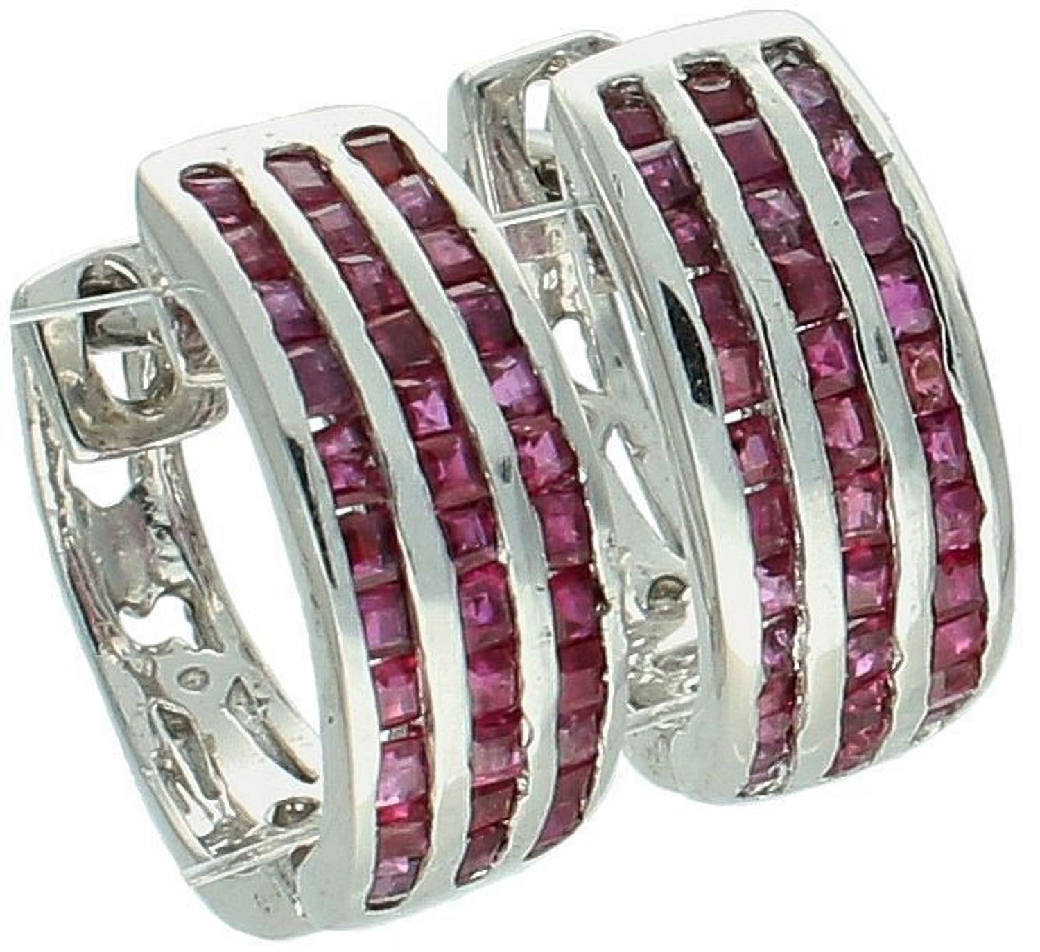 Eleganckie kolczyki damskie srebrne próba 925 w formie kół, zdobione naturalnymi rubinami. Bezpieczne zapięcie angielskie. Idealne na prezent i na co dzień. Model K1167.1.jpg